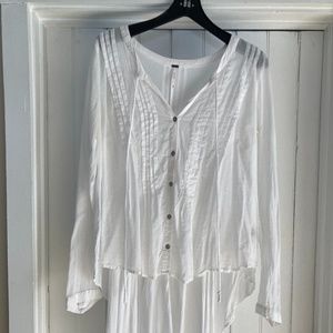 FREE PEOPLE flowing, light, sexy peasant blouse can accent all of you!